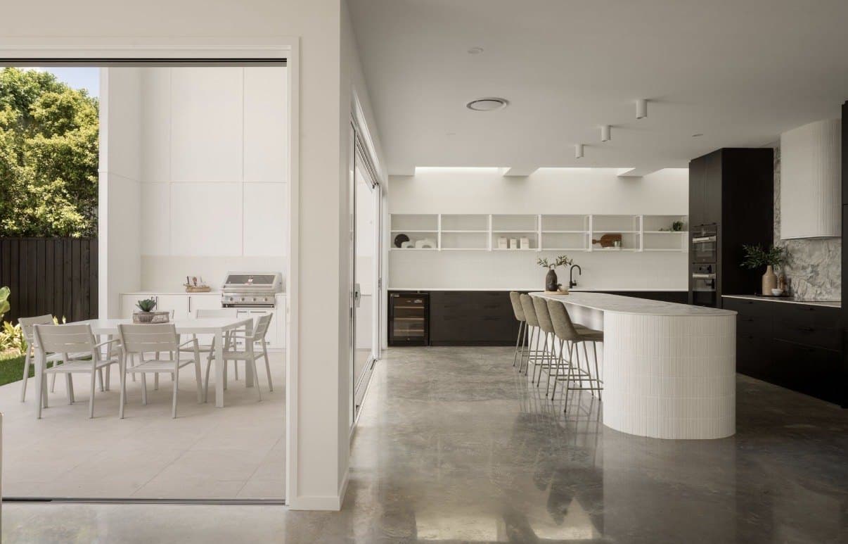 Kitchen and dining with a reflective polished concrete floor
