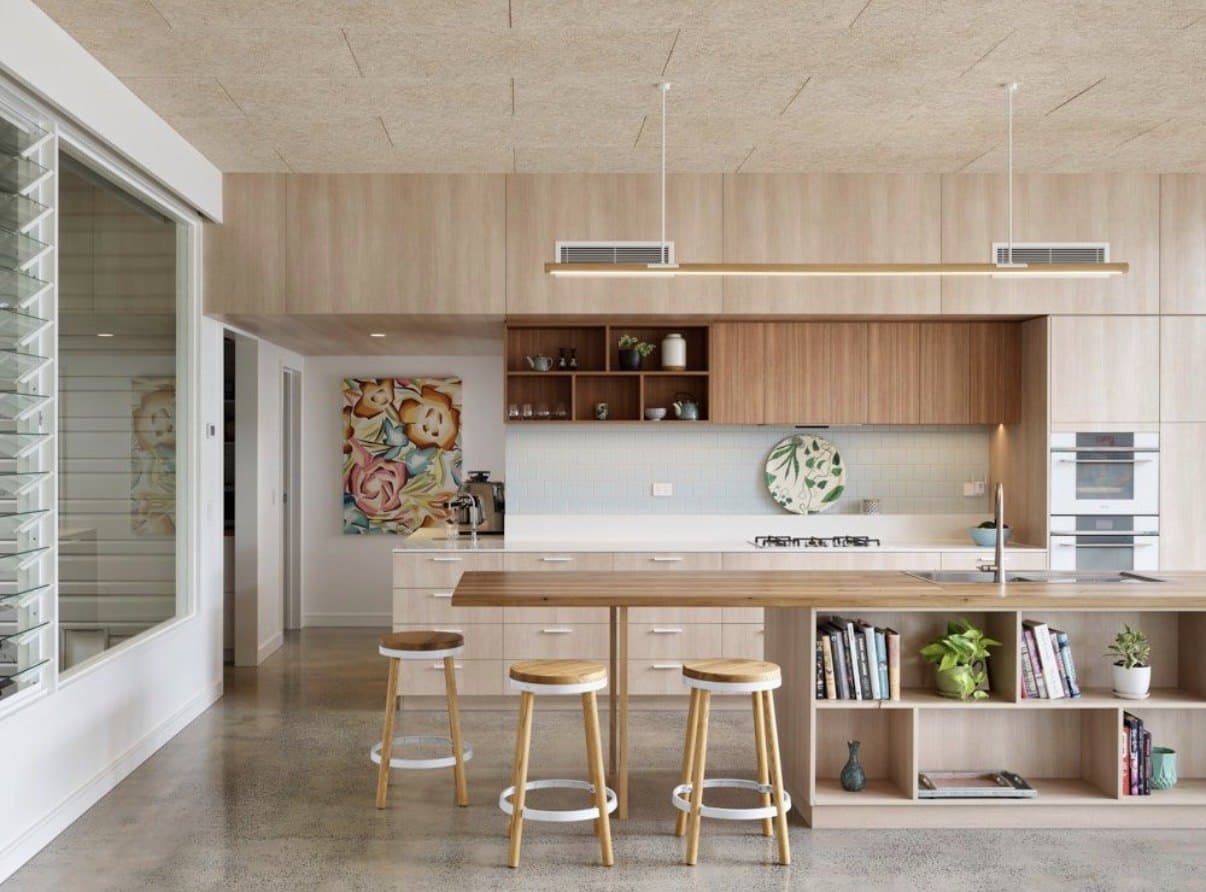 Kitchen with timber cabinetry and a polished concrete floor